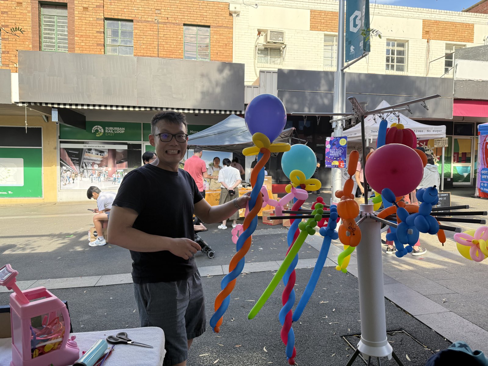 Box Hill Twilight Markets, Valentine's Day — a drying rack makes a fine balloon tree.