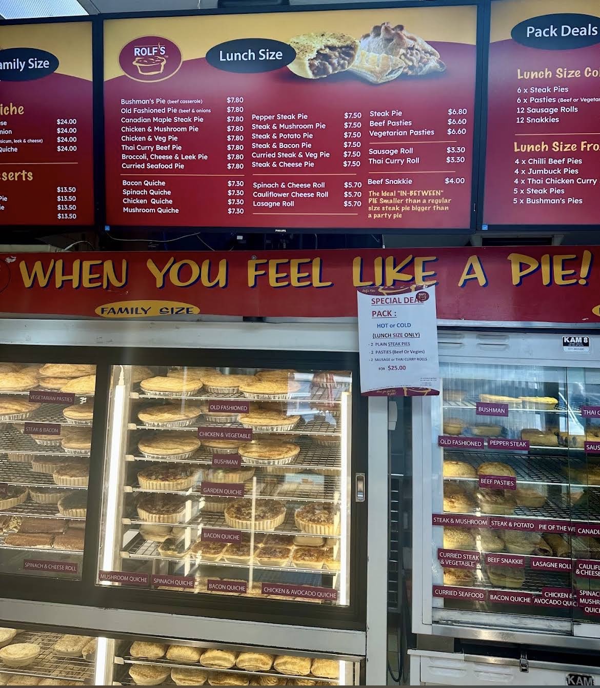Rolf's Pies menu board and display case