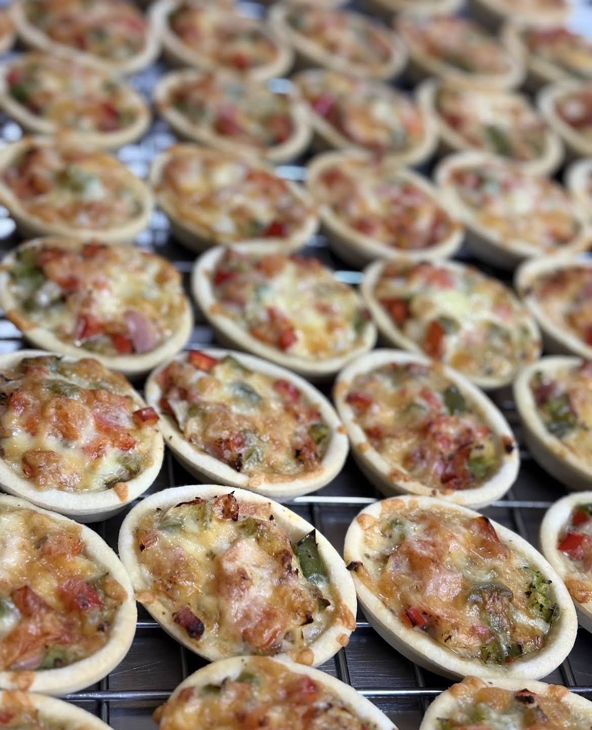 Mini vegetable quiches in trays
