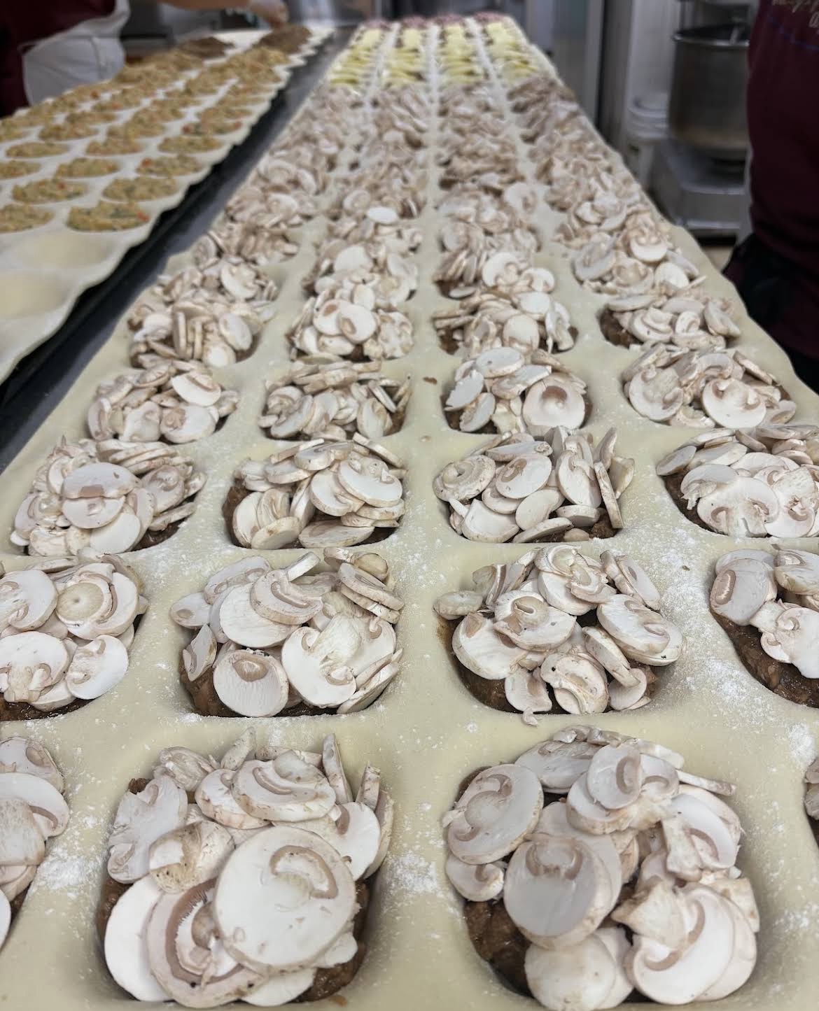 Fresh quiches cooling in a tray